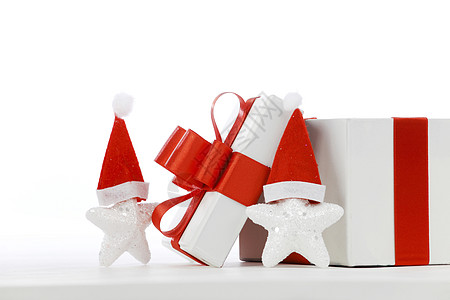 圣诞星 丝带 白色的 盒子 帽子 圣诞节 新年 假期 庆祝图片