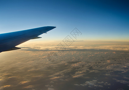 日落时翼飞机天高清图片素材