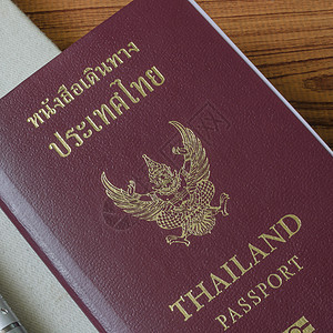 泰籍护照 商业 泰国 交换 数据 文档 铅笔 芯片 现金背景图片