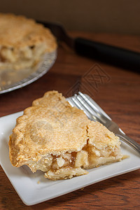 果实苹果派 温暖的 小吃 脆皮 甜的 食物 馅饼 木头背景图片