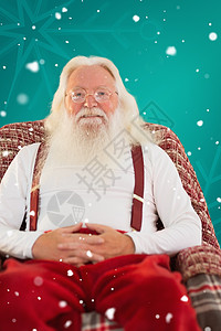 圣诞节老人父亲圣诞节坐在扶手椅上的复合图像 其喜悦 舒适 快乐背景