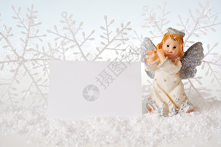圣诞天使孤立在白色背景的白幕后图片