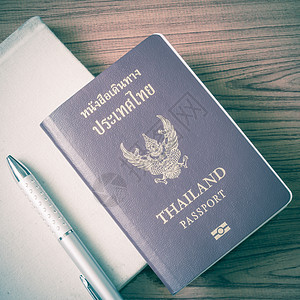 泰籍护照 国家 芯片 硬币 教科书 身份 安全 旅游背景图片