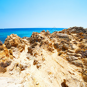 和海滩蓝SK的岩石海与沙滩上 自然 季节 岛图片