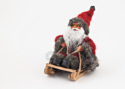 圣诞老人在雪橇树玩具上留胡子 与世隔绝 手工制作的图片