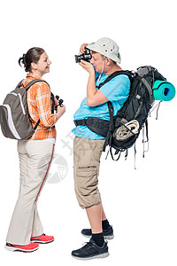 带背背包照他女朋友的相片的游客图片