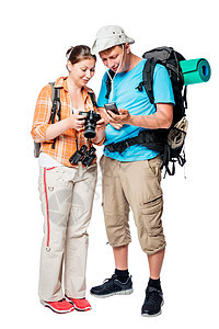 带背包的活跃观光游客观看白色面包上摄像头的照片图片