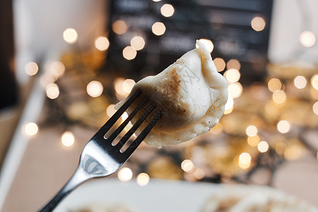 圣诞卷子晚餐 烹饪 水饺 圣诞节 洋葱 食物 盘子背景图片