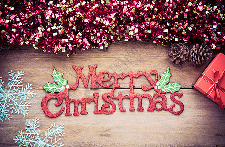 圣诞节庆祝活动的装饰品放在木头佛罗洛上 装饰风格图片