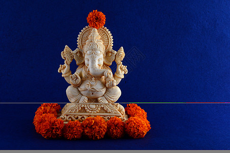 印度神象头神 在蓝色背景上的象头神偶像 和平图片