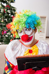 圣诞庆典中搞笑的小丑概念 戏服 记忆 男人 漫画图片