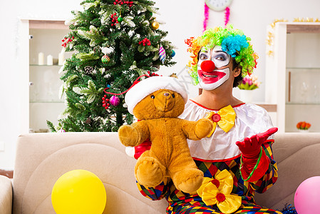 圣诞节气球圣诞庆典中搞笑的小丑概念 漫画 熊 假发 娱乐背景