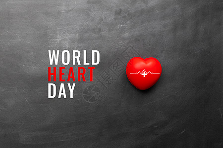 世界心脏日概念 黑色背景的红心;图片