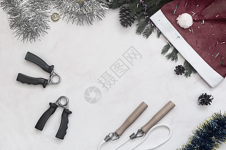 圣诞快乐贺卡和运动生活方式概念 游戏 水平的 手部锻炼器背景图片