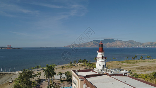 苏比克湾有海滩和灯塔的海岸线背景