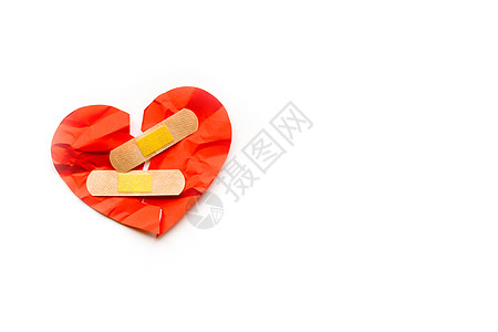 断裂的红心符号 白色背景上的医学补丁 爱的概念 愈合 天 离婚图片