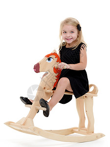 女孩在木马上摇摆 活动 摆动 游戏 闲暇 幸福 骑师图片