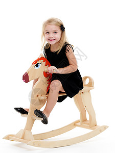 女孩在木马上摇摆 快乐的 乐趣 满意 骑师 享受 闲暇图片