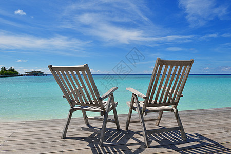 热带热带沙滩椅 美丽 晴天 水 异国情调 海洋 绿松石图片