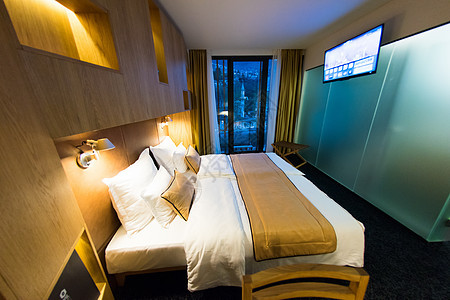 现代旅馆房间 酒店 睡觉 旅行 枕头 奢华 灯 装饰风格图片
