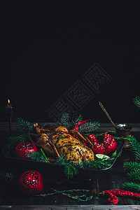 圣诞鸭 有石榴和石灰 环绕在瓜子枝旁 食物背景图片