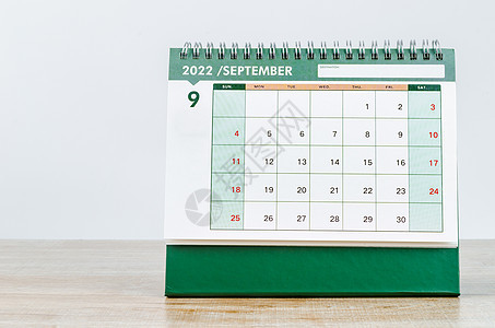 2022年9月 在木制桌上的案头日历 日程商业高清图片素材