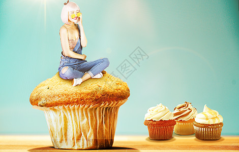 坐在蛋糕上的女孩图片
