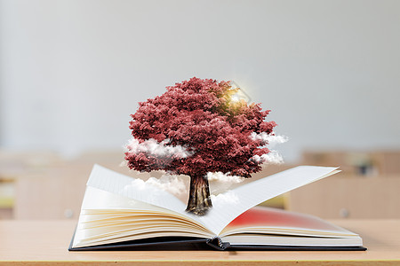 创意爱情树合成的书和树图高清图片