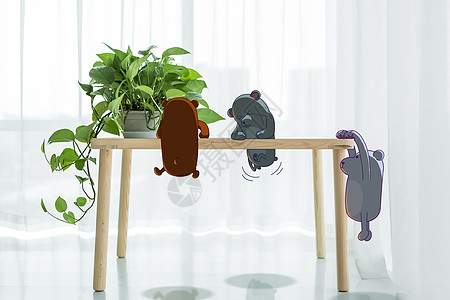 小熊翻桌子植物费力高清图片
