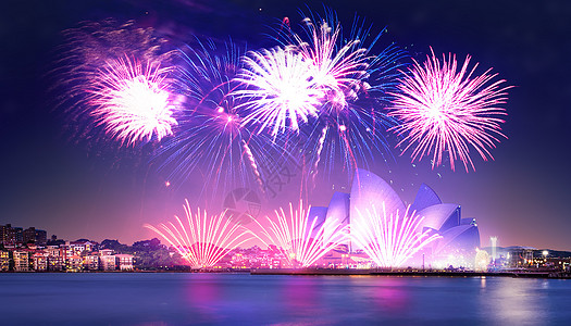 海边夜空海边城市烟花场景设计图片