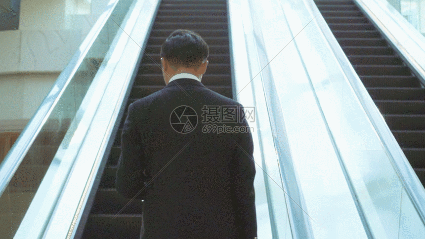 商务男士乘电梯背影gif动图图片-正版gif素材-摄