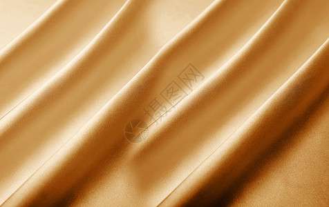 黄布金色丝绸背景设计图片
