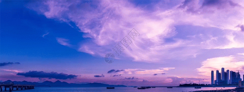紫色建筑晚霞中的海湾gif动图高清图片