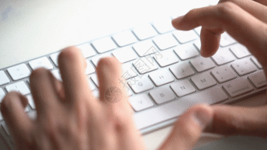 笔记本键盘手在键盘上打字GIF高清图片