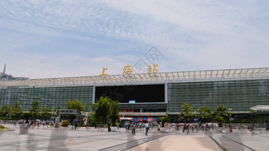 咖啡厅外景上海火车站延时GIF高清图片