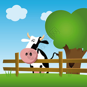 说明一头奶牛在绿地上图片
