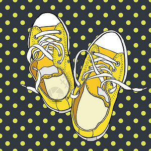 Polka点背景上的一对黄色运动鞋手工绘制背景图片