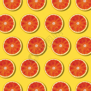 黄色颜背景的红橙色切片模式图片