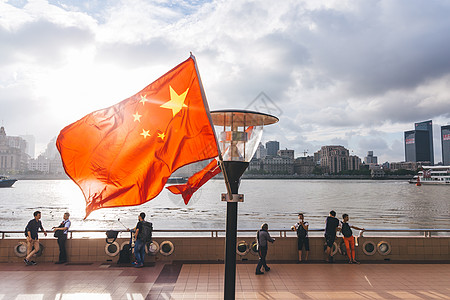 法定假日逆光外滩国庆五星红旗背景