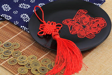 铜钱传统工艺品中国结剪纸背景