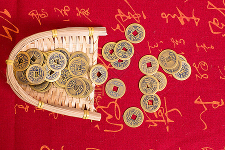 簸箕中国风清代铜钱拍摄背景图片