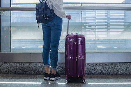 机场旅行箱放假旅游女人背景等待背景