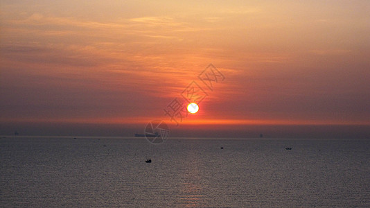 清晨天空海边日出背景