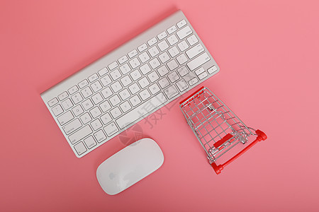 红色购物车键盘鼠标组合高清图片