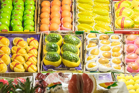 绿色商场色彩丰富的水果摊背景