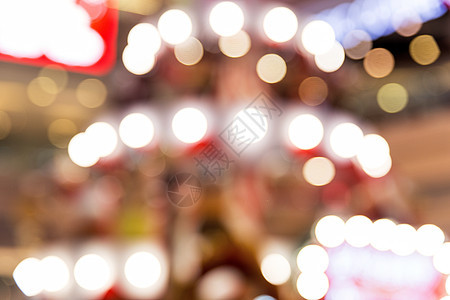 城市商场圣诞树灯光虚化背景图片