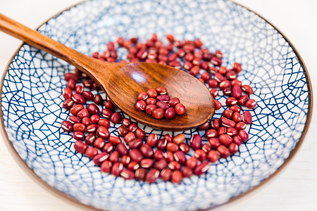 文艺木匙盘子能量红豆棚拍图片