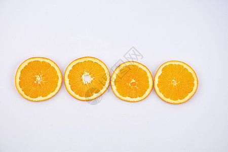 橙子背景水果切片摆拍高清图片