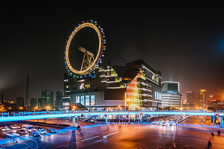 城市夜景慢门车流背景图片