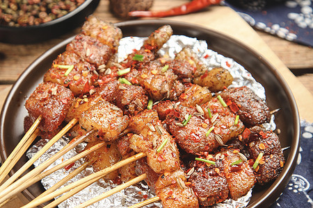 新疆美食烤羊肉串背景图片